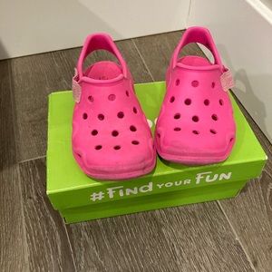 Pink crocs